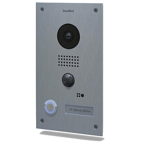 DoorBird video doorbell featuring a sleek stainless steel design, camera, speaker, and illuminated button, relevant to smart home technology discussions.