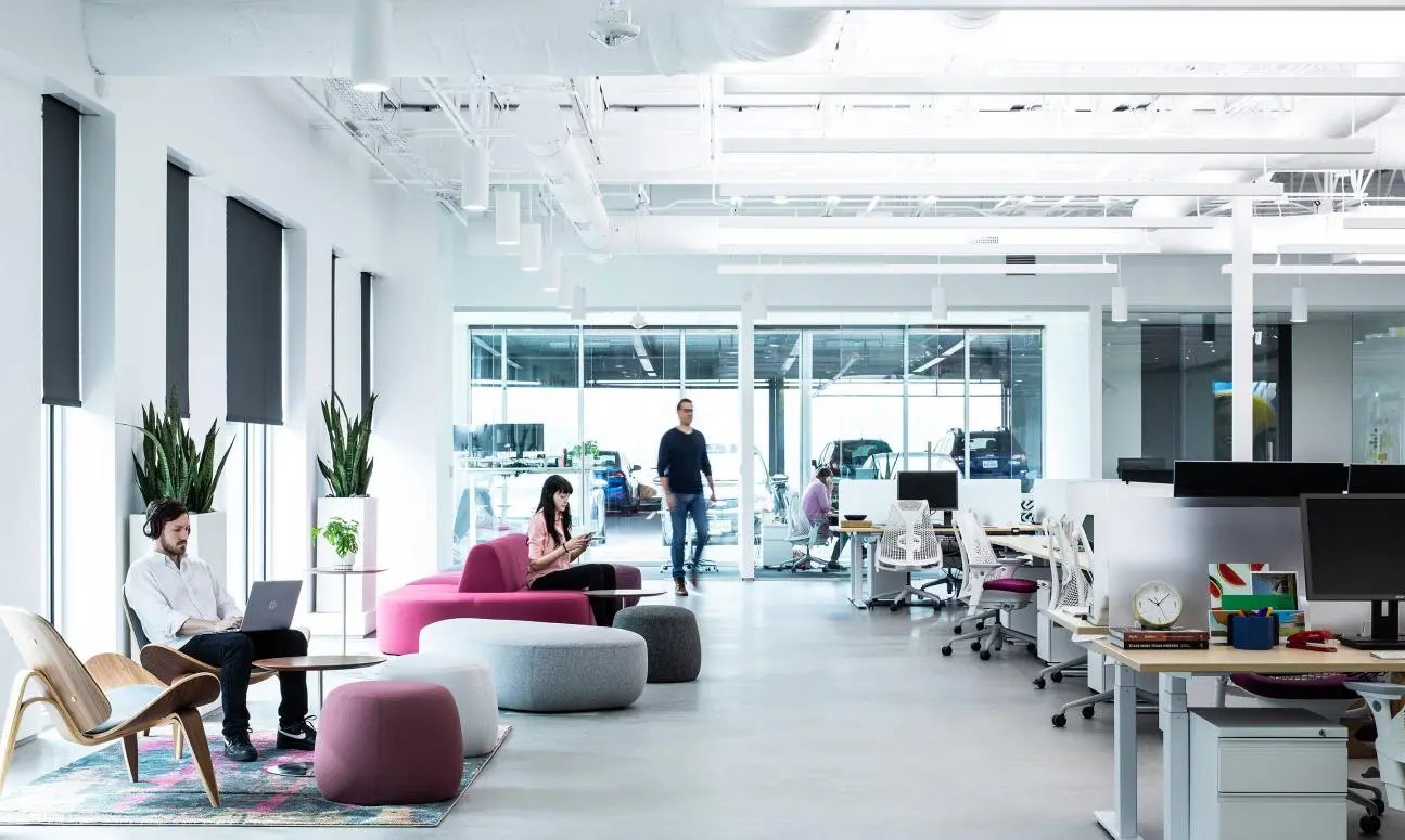 Open workspace at Ketra headquarters with Lutron shades along the windows